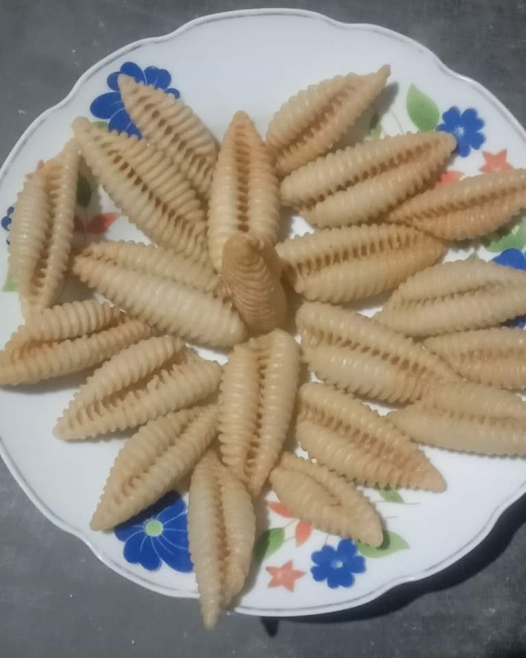 Jinok Pitha (ঝিনুক পিঠা)